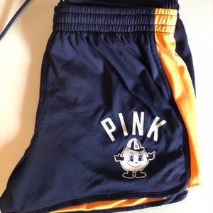 SYRACUSE orange shorts by pink.